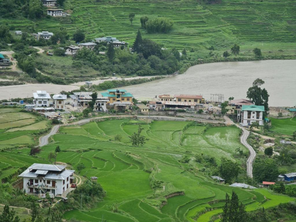 Climate Change Drives ‘Emptying’ of Rural Bhutan Despite Carbon-Negative Status